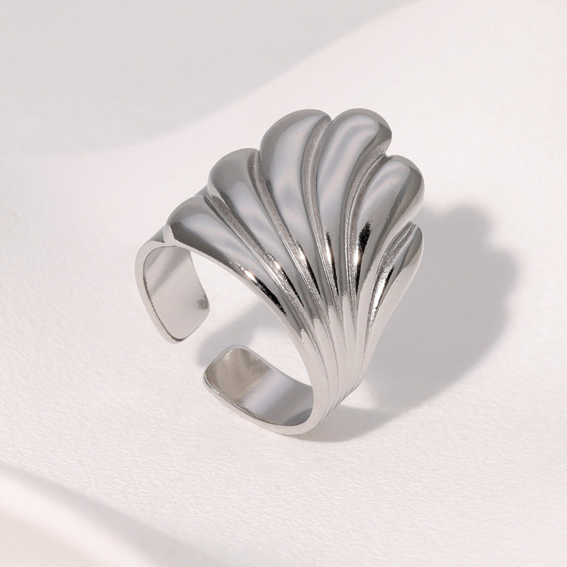 Geometric Minimalist Stainless Steel Ring for Women with Gold Plating, Ocean Wave Pattern, Cool-Tone Retro Fashion Design