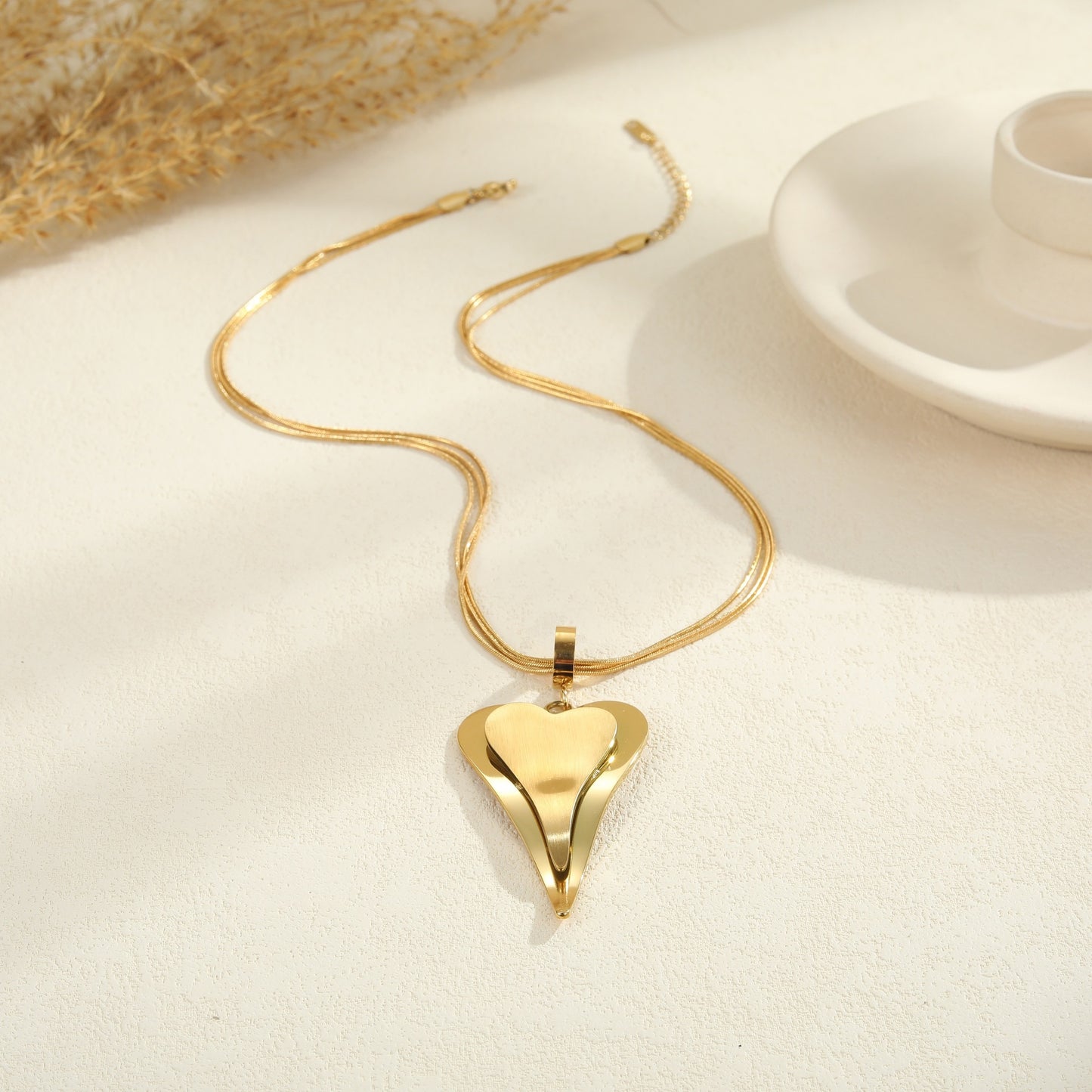 Collar de cadena de serpiente de doble corazón de moda en acero inoxidable con acabado chapado para mujer