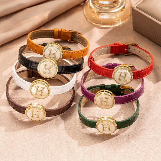 Bracciale a Polsino Tondo Minimalista in Acciaio Inossidabile Placcato Oro con Cinturino in Vera Pelle per Uomo e Donna