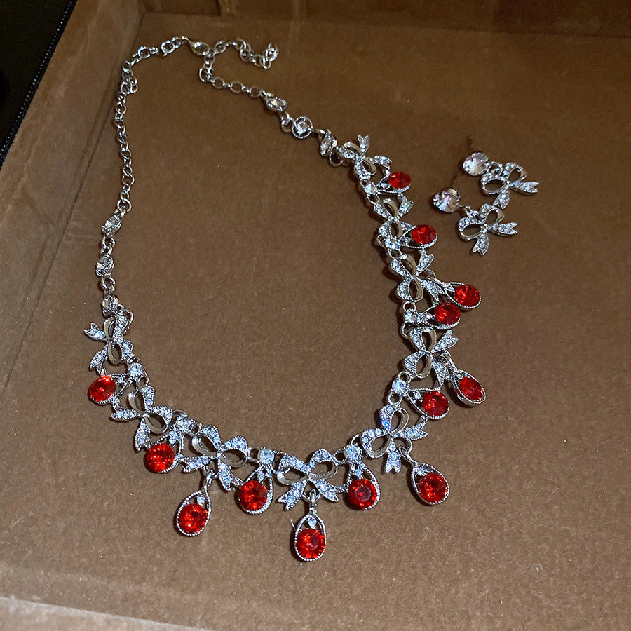 Elegante set collana con ciondolo a goccia e orecchini a perno in lega con intarsio di strass, stile lusso minimalista da donna