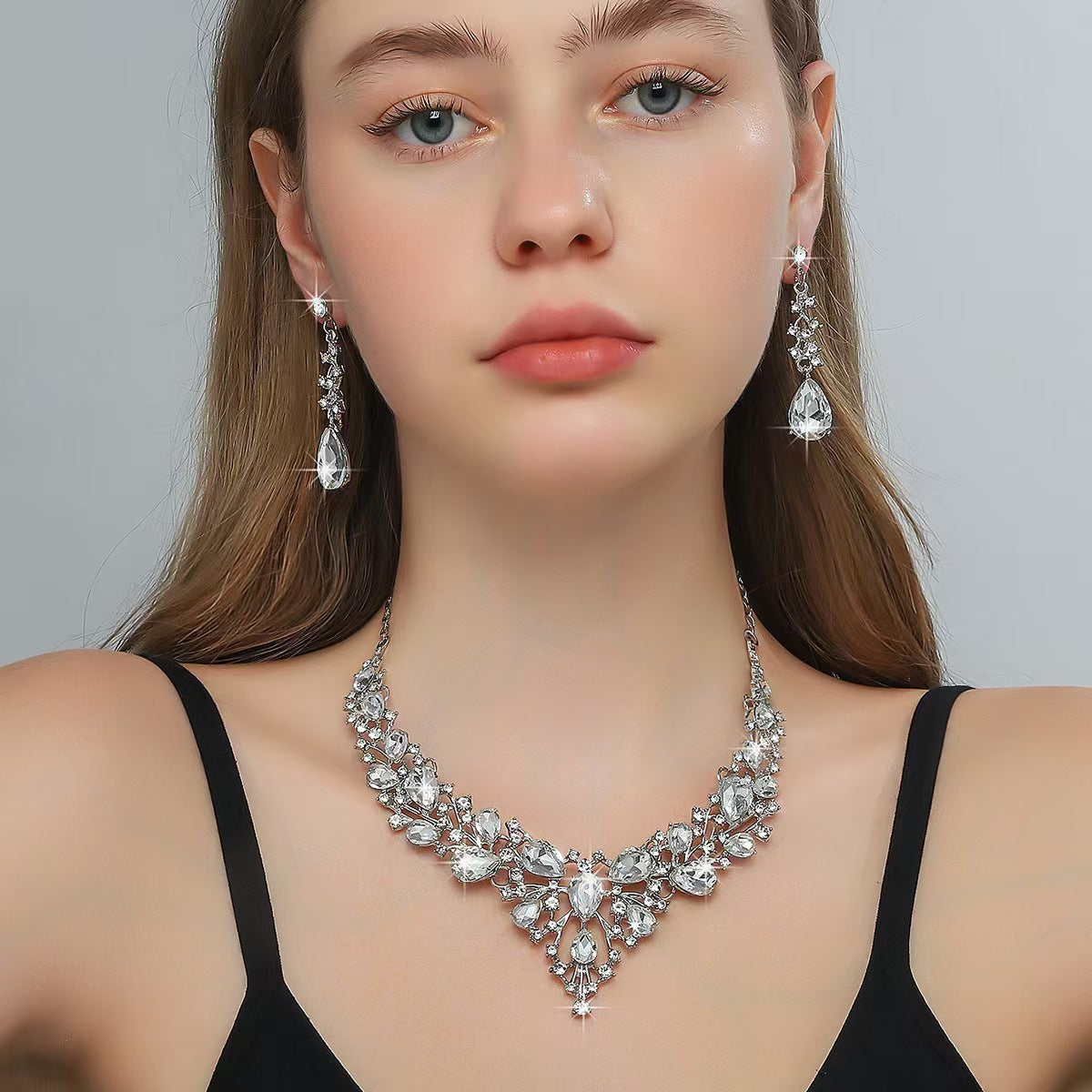 Elegant Waterdrop Floral Pattern Rhinestone Pendant Necklace Earrings Bracelet Set for Women with Alloy Base and Plated Finish