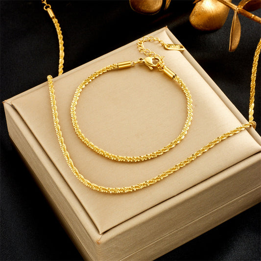Set collana e bracciale da donna in acciaio al titanio intrecciato con finitura placcata, dal design minimalista e alla moda