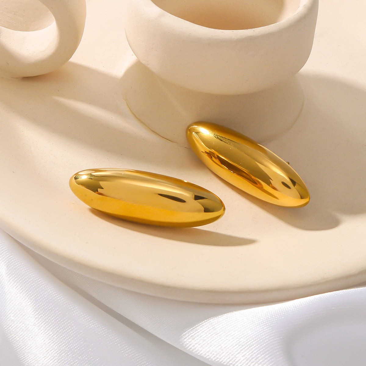 Minimalist Geometric Stainless Steel Drip-Shaped Earrings for Women with 18K Vacuum Plating Finish
