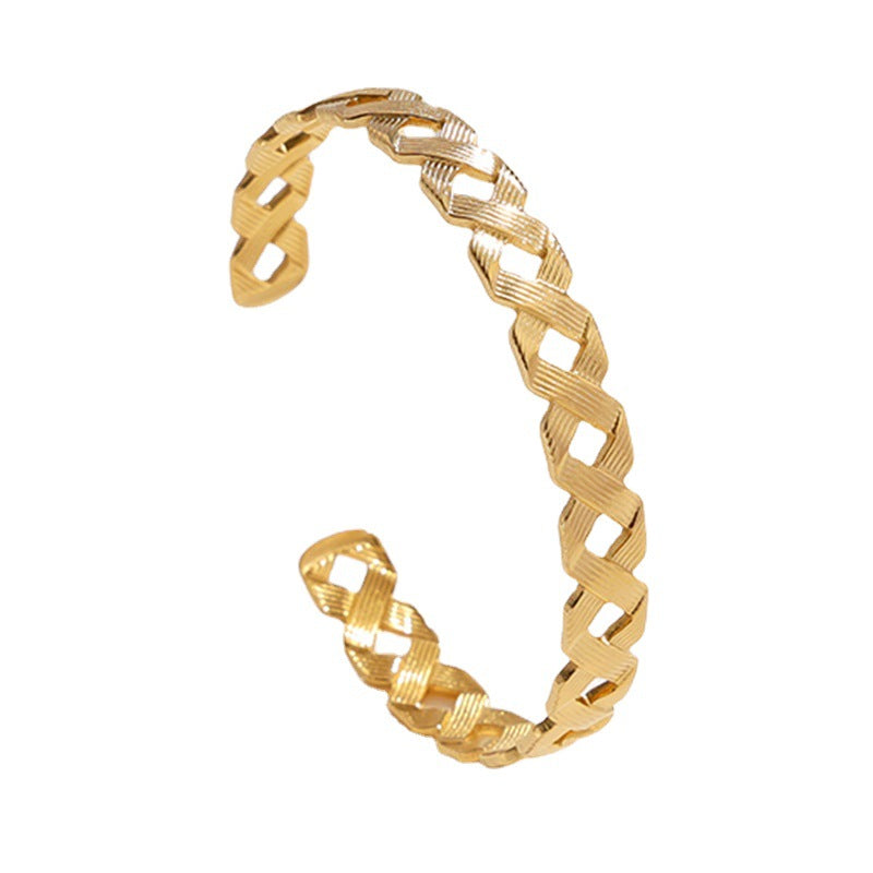 Pulsera esclava abierta ajustable de acero de titanio con forma de C hueca geométrica para mujer con acabado chapado