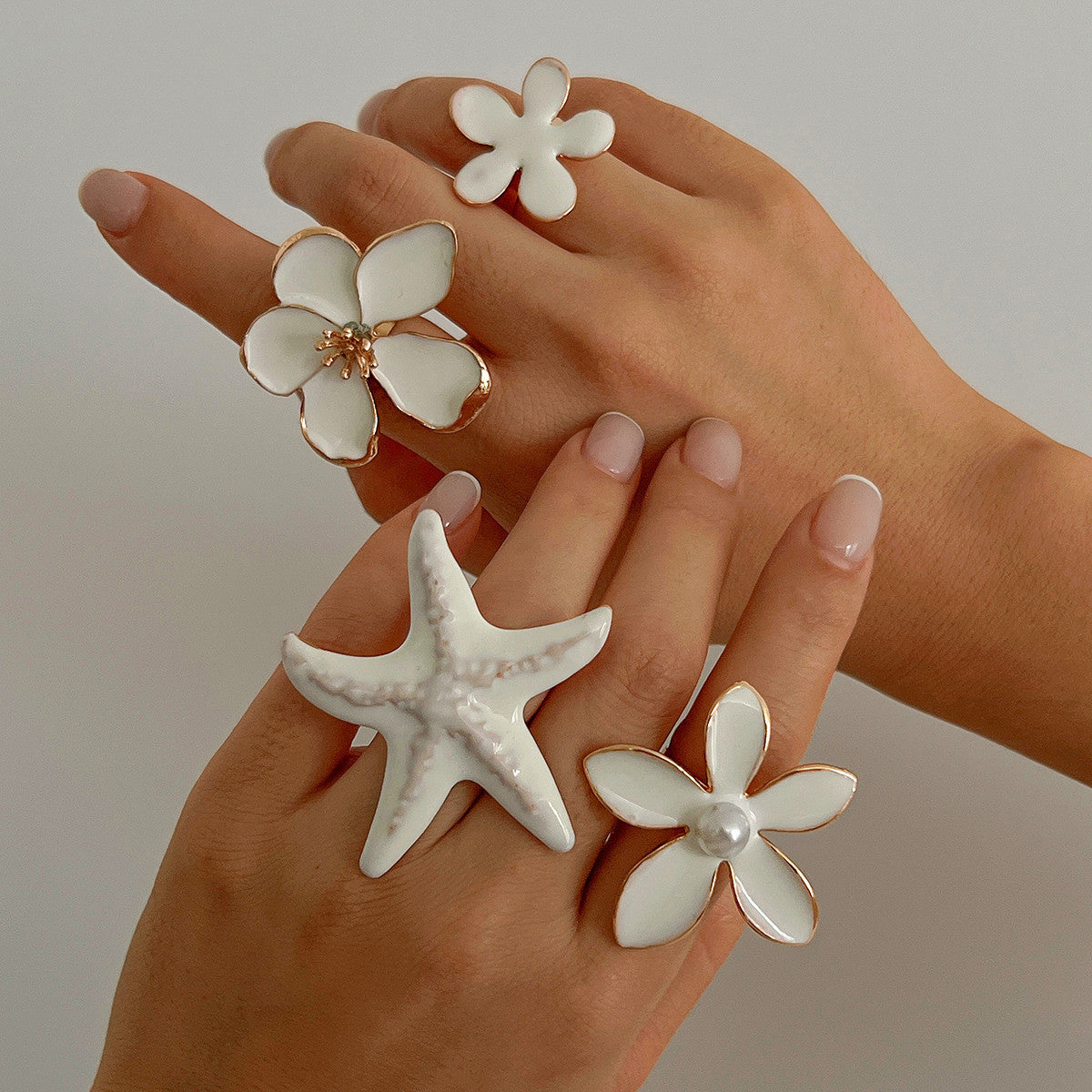 Anillo abierto con forma de flor de cinco pétalos, diseño minimalista, de estrella de mar en 3D, de hierro con acabado esmaltado