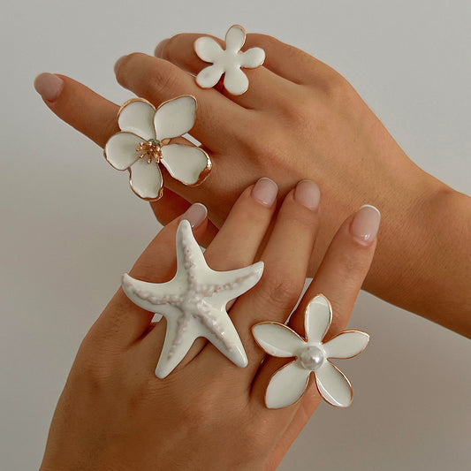 Anillo abierto con forma de flor de cinco pétalos, diseño minimalista, de estrella de mar en 3D, de hierro con acabado esmaltado