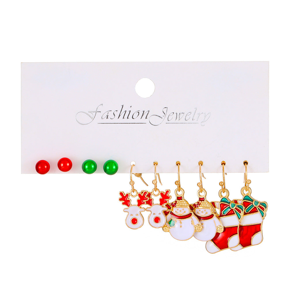 Juego de pendientes de aleación con temática navideña para mujer con dijes esmaltados de ciervo y Papá Noel, diseño geométrico, acabado chapado