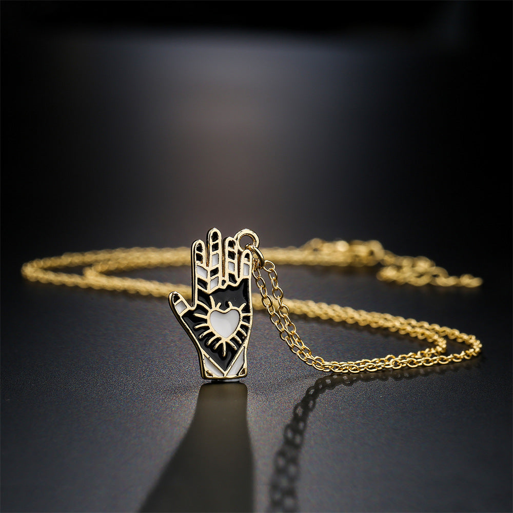 Minimalist Hand-Shaped Pendant Necklace in Copper with 18K Gold Plating and Enamel Detail