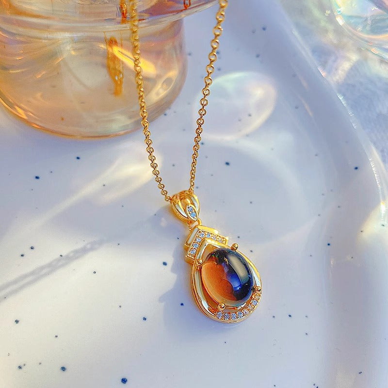 Collar termocrómico de gota de agua para mujer en acero de titanio con colgante chapado en oro, diseño floral y forma irregular en cadena tipo O