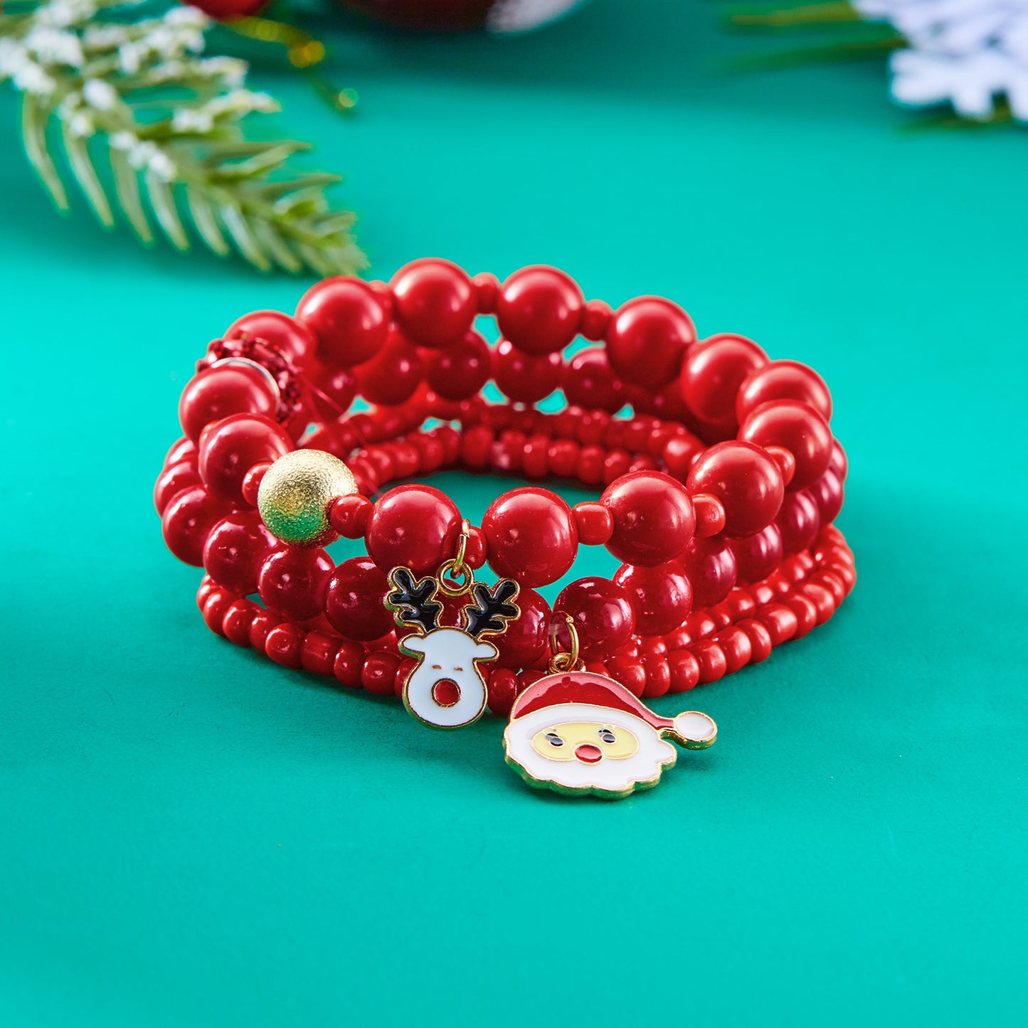 Set di braccialetti acrilici con perline a tema natalizio alla moda con ciondoli di Babbo Natale e pupazzo di neve da donna