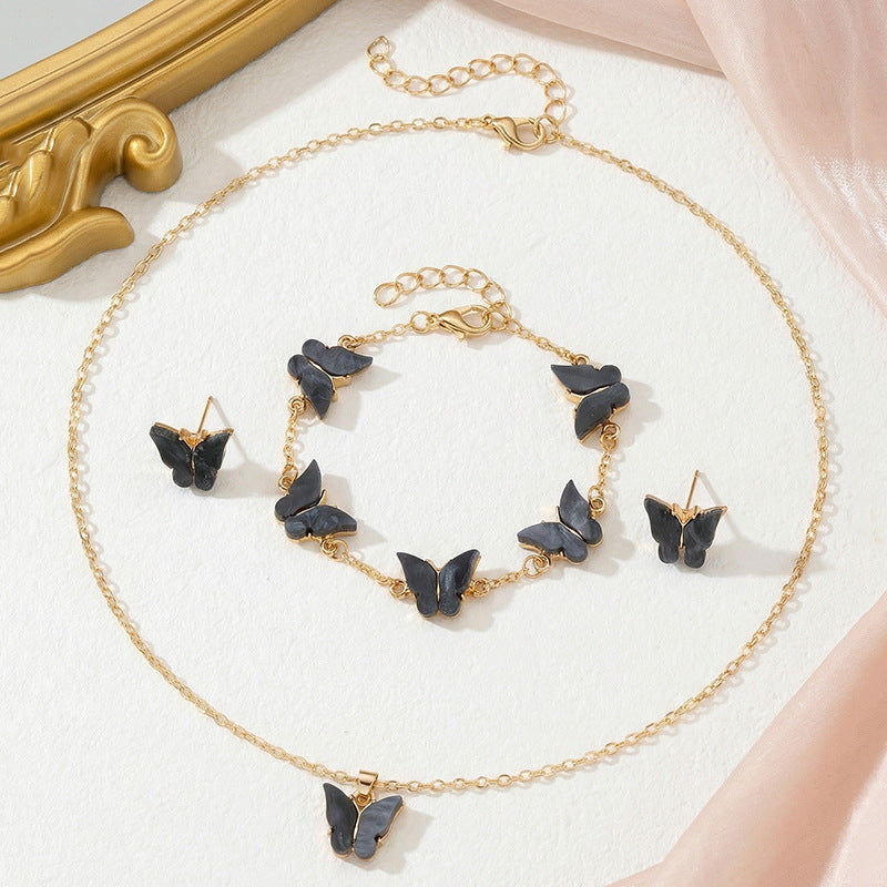 Set di collana con ciondolo a farfalla minimalista per ragazze, gioielli placcati in lega con catena di perline