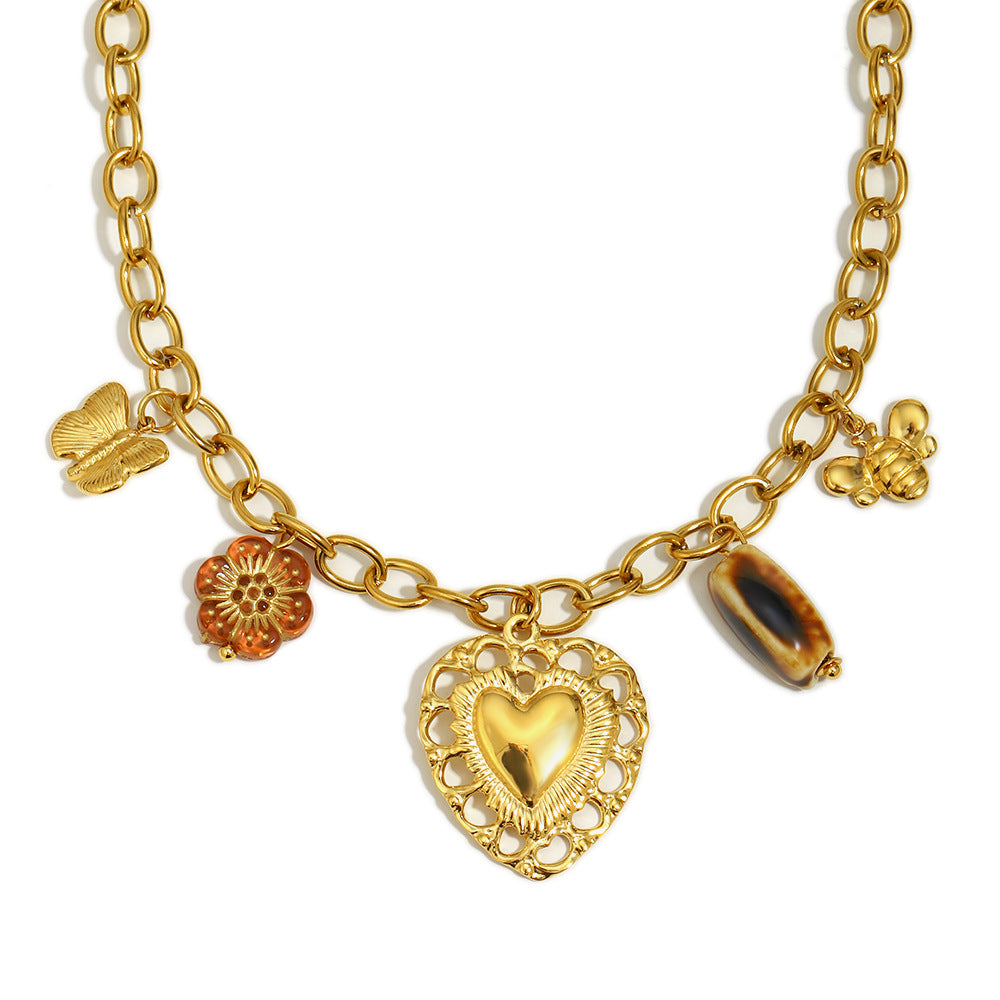 Luxury Vintage Hollow Heart Pendant Necklace in Stainless Steel with 18K Gold Plating on O-Chain