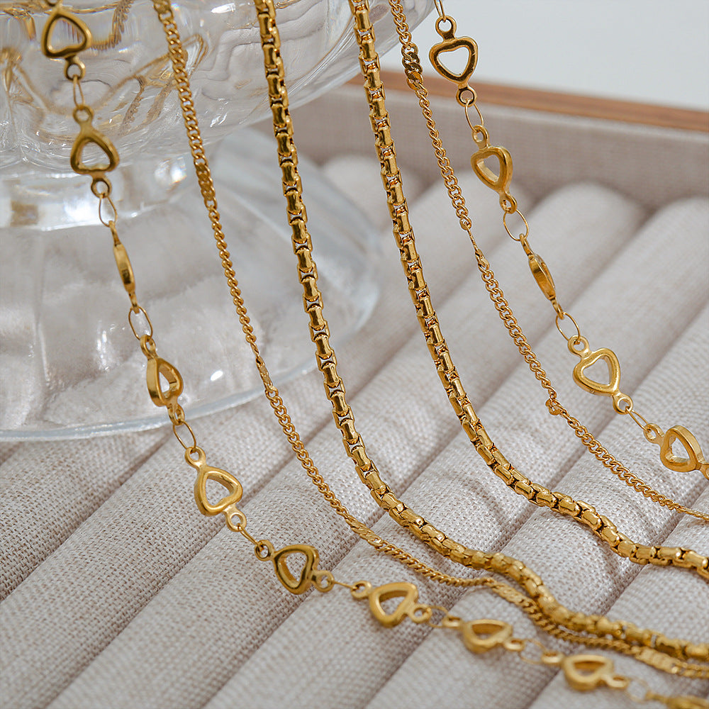 Collar en capas de corazón minimalista de acero de titanio chapado en oro de 18 quilates para mujer