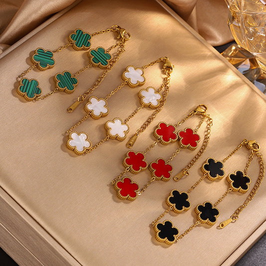 Pulsera de acero inoxidable con baño de oro y acrílico con diseño floral elegante para mujer