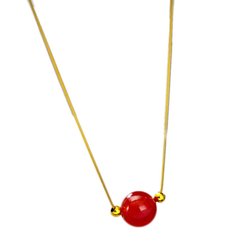 Collana con ciondolo floreale minimalista in agata rossa per donna con catena a serpente in acciaio al titanio e finitura placcata