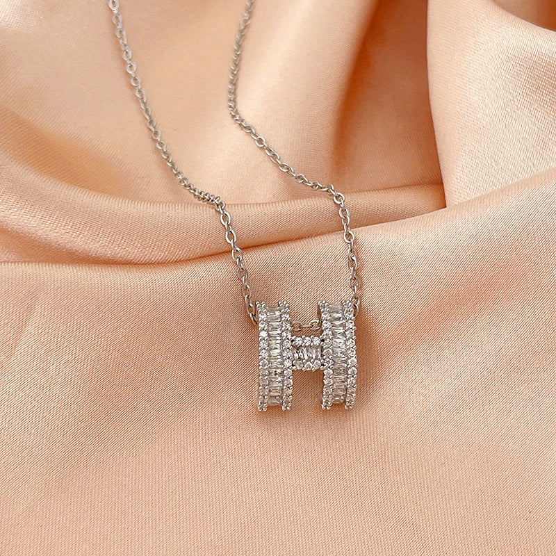 Luxury Minimalist Geometric Letter H Pendant Necklace for Women in Titanium Steel with Gold Plating, Wavy Chain Style