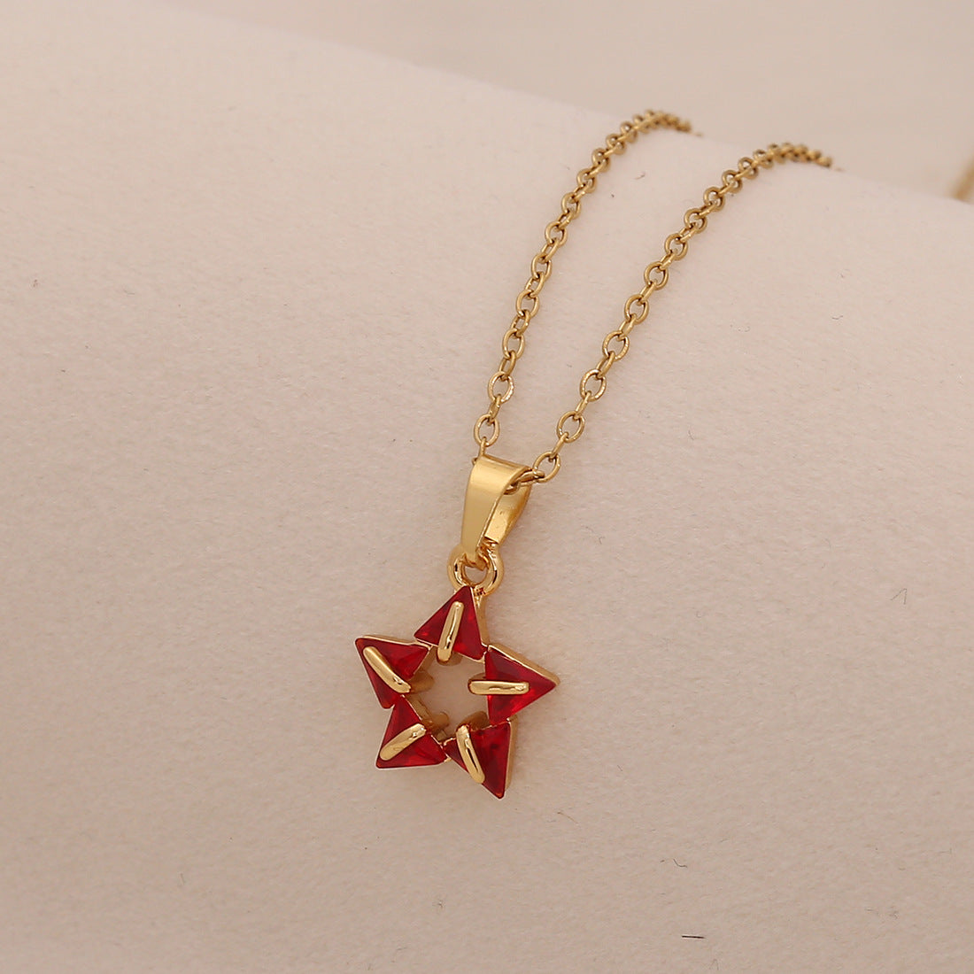 Collana da donna alla moda a forma di stella in acciaio inossidabile con intarsio di strass e finitura placcata