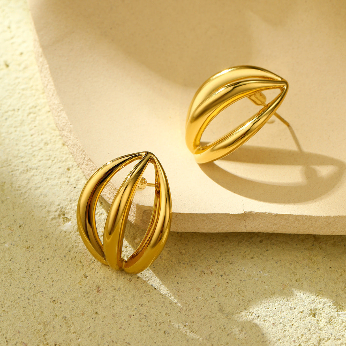 Vintage-Style Irregular Hollow-Out Titanium Steel Earrings for Women with 18K Gold Plating