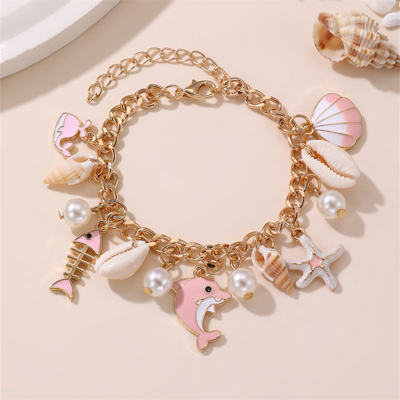 Pulsera de resina en forma de estrella con dijes de temática marina para niñas de 6 a 10 años