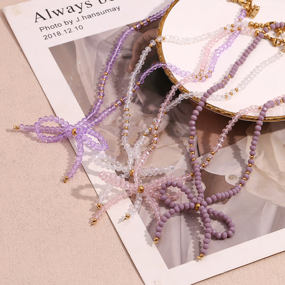 Elegante collar con colgante de titanio en forma de lazo con cuentas de acero inoxidable galvanizadas para mujer