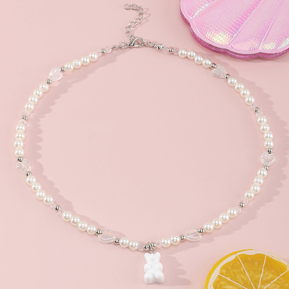 Collana con ciondolo in resina a forma di orsetto e cuore per bambine con catena di perle a lunghezza regolabile