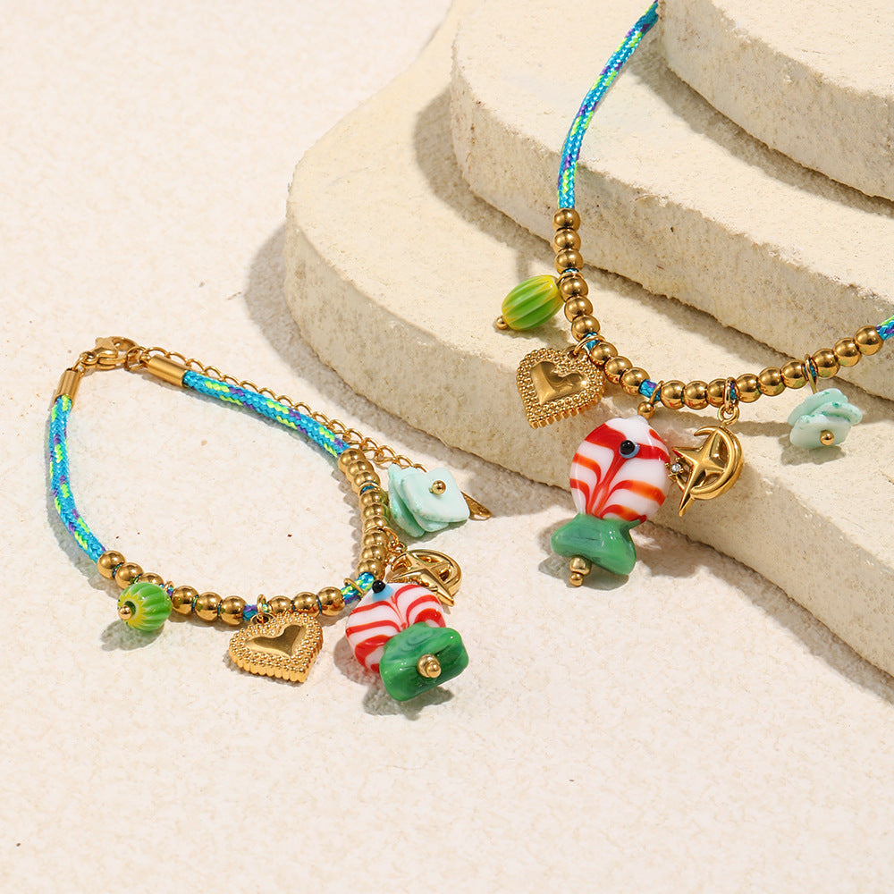 Collar de acero inoxidable geométrico chapado en oro de 18 quilates con dije de caramelo azul y cordón trenzado de colores para mujer
