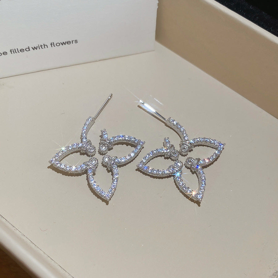 Pendientes florales minimalistas con incrustaciones de circonita en postes de acero inoxidable para mujer
