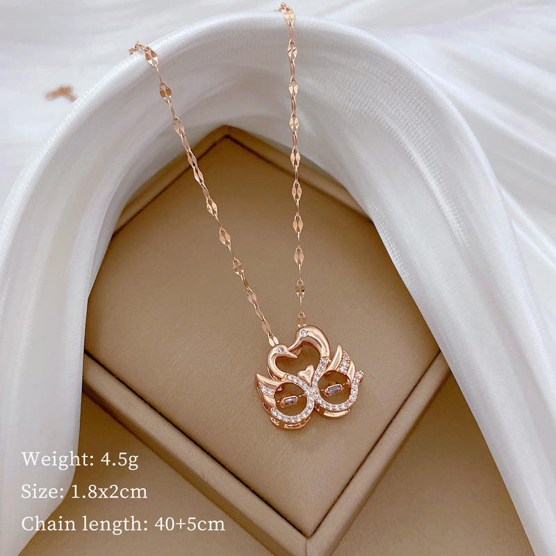 Elegante collar con colgante de cisne para mujeres y hombres, cadena de acero de titanio con incrustaciones de diamantes de imitación, estilo relicario de lujo, diseño geométrico minimalista