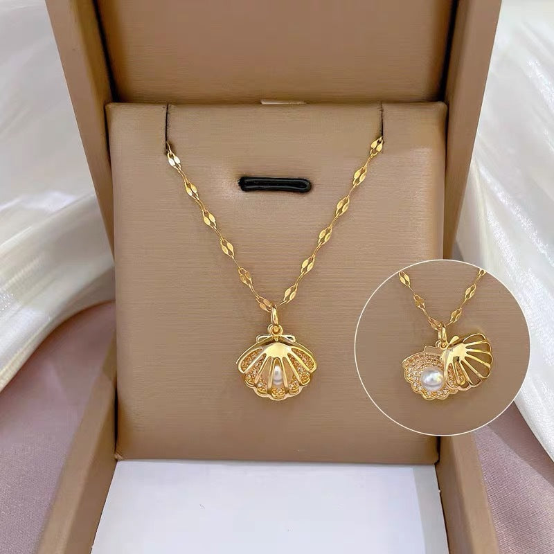 Light Luxury Geometric Titanium Steel Necklace with Hollow Shell Pendant, Micro-Paved Zirconia, Gold-Plated, Pearl Accents, Wavy Chain