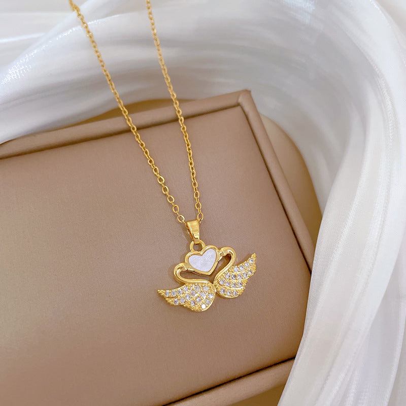 Collana con ciondolo a luna geometrica di lusso con intarsio in strass e catena in acciaio inossidabile unisex