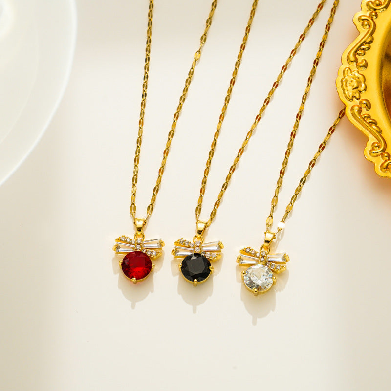 Elegante Collar con Colgante de Lazo para Mujer en Acero Titanio con Incrustaciones de Pedrería y Cadena Ondulada