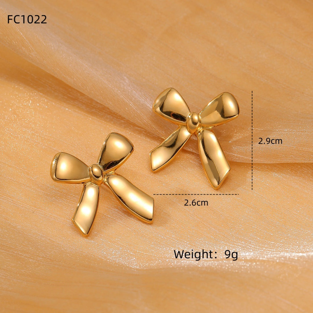 Elegantes Pendientes de Acero de Titanio con Forma de Lazo Bañados en Oro para Mujer