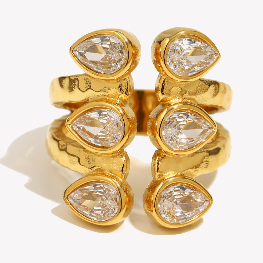 Anello di lusso in acciaio inossidabile geometrico stile francese con placcatura in oro 18 carati e zirconi a goccia asimmetrici a doppio strato