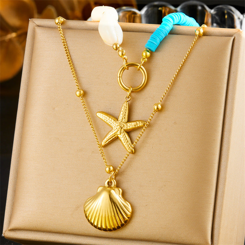 Collana a strati con ciondolo a stella marina e perla in acciaio inossidabile Fashion Office con charm a conchiglia e catena a scatola color oro
