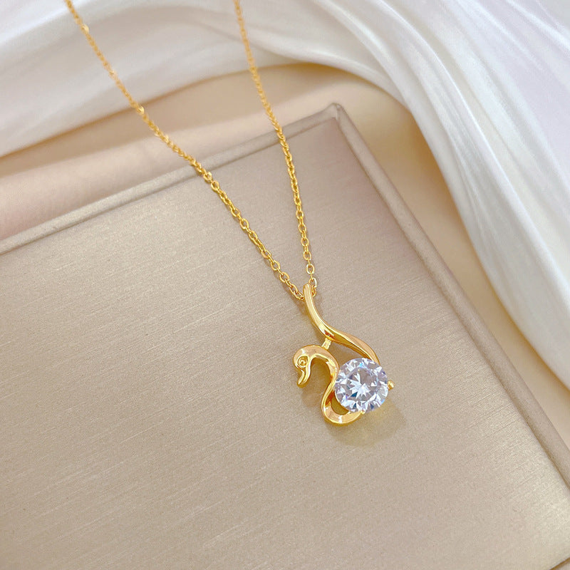 Collana con ciondolo a cigno in acciaio al titanio, lusso minimalista, con intarsio in strass, da donna, a forma di medaglione geometrico con catena