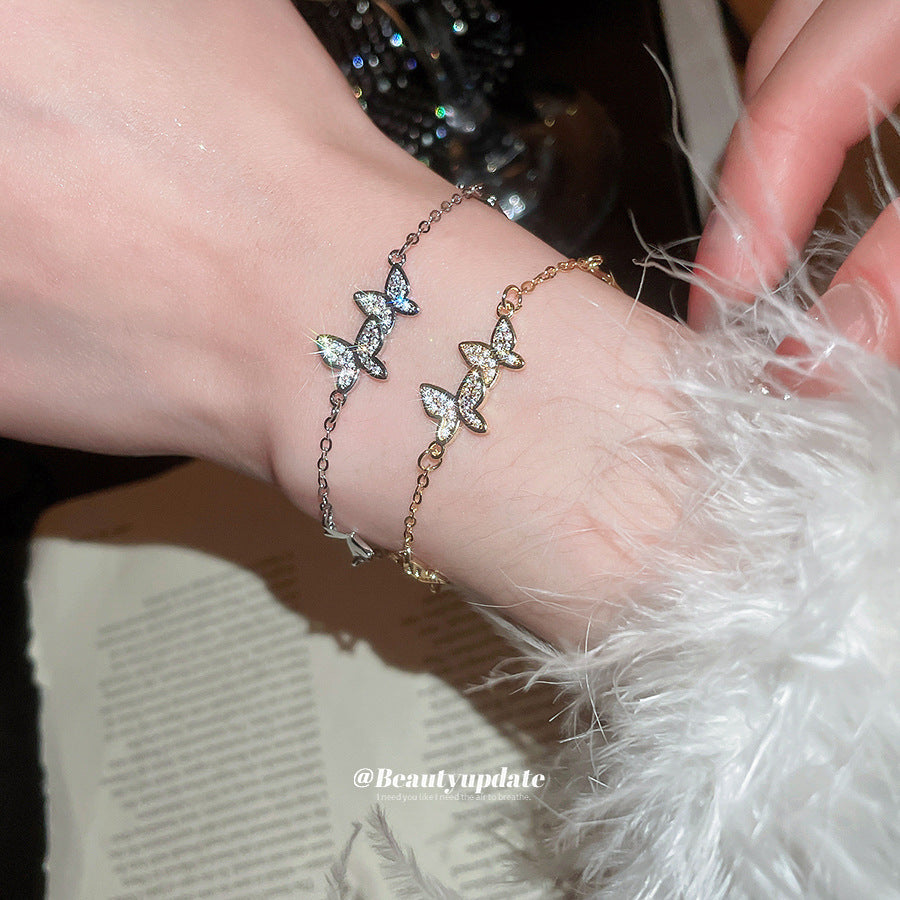 Elegante bracciale da mano a farfalla da donna, in rame con intarsio di zirconi cubici, bracciale stile lusso minimalista per l'uso quotidiano