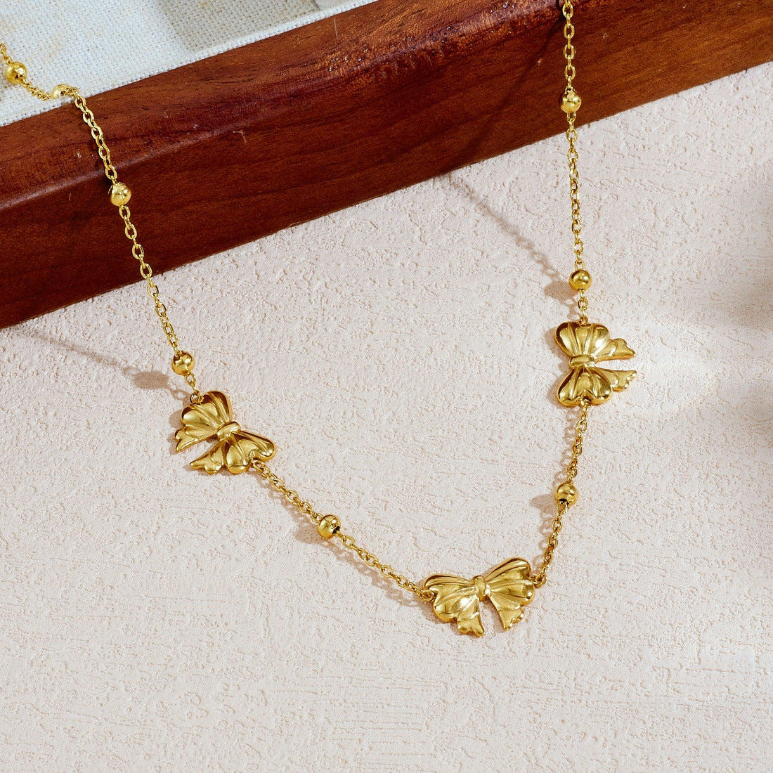 Minimalist Gold Plated Stainless Steel Ball Chain Necklace with Bow Pendant for Women