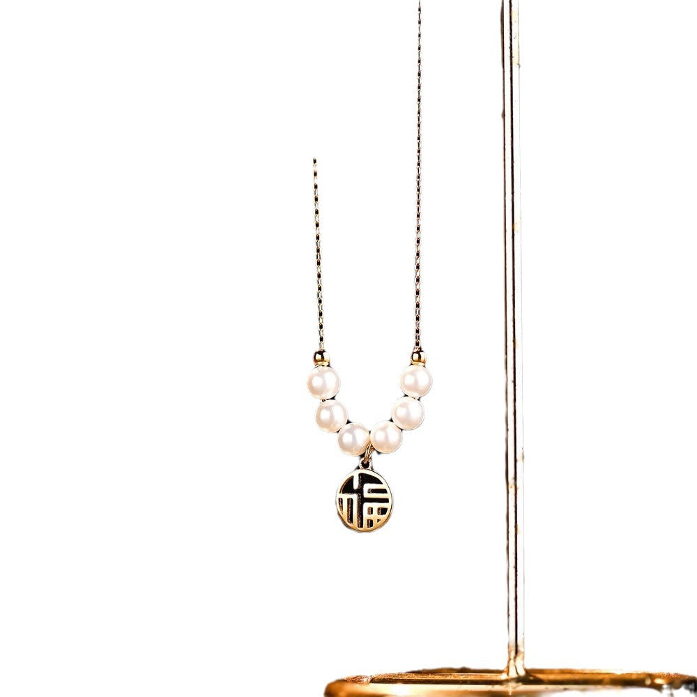 Collana con ciondolo a forma irregolare minimalista in acciaio al titanio placcato, portafortuna da donna