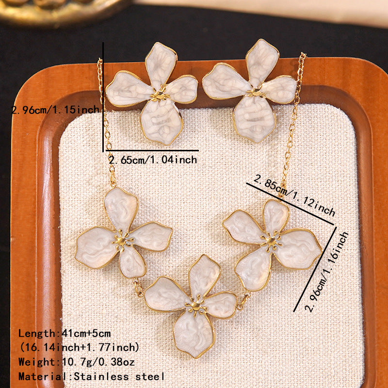 Set di collana e orecchini in acciaio inossidabile da donna con piante floreali a goccia, eleganti e minimalisti