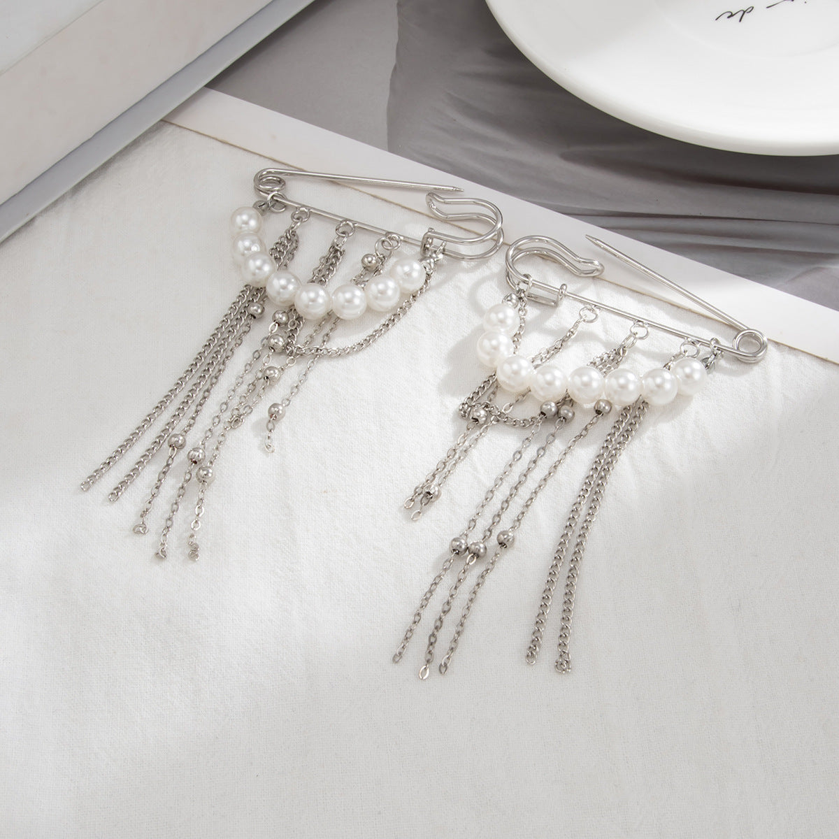 Cavigliera da donna con ciondolo a perla geometrico, catena, nappa e design regolabile