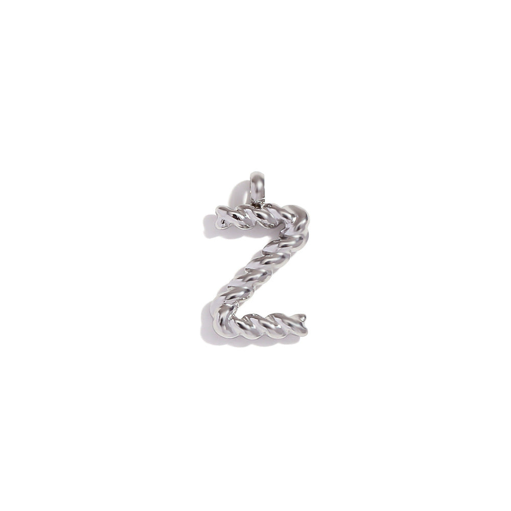 Colgante minimalista de acero inoxidable chapado en oro de 18 quilates con mini letra retorcida para mujer