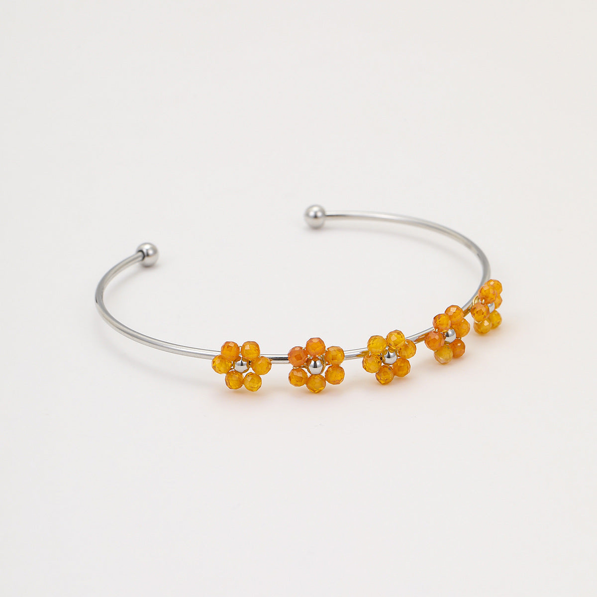 Bracciale da donna in acciaio inossidabile alla moda con motivi floreali, forma geometrica e finitura placcata
