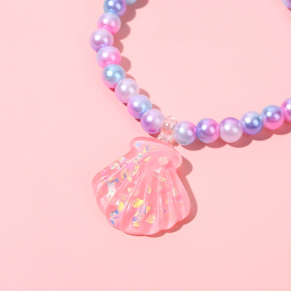 Juego de pulseras de resina con cuentas en forma de corazón estilo caricatura con dijes de cola de sirena y conchas marinas para niños