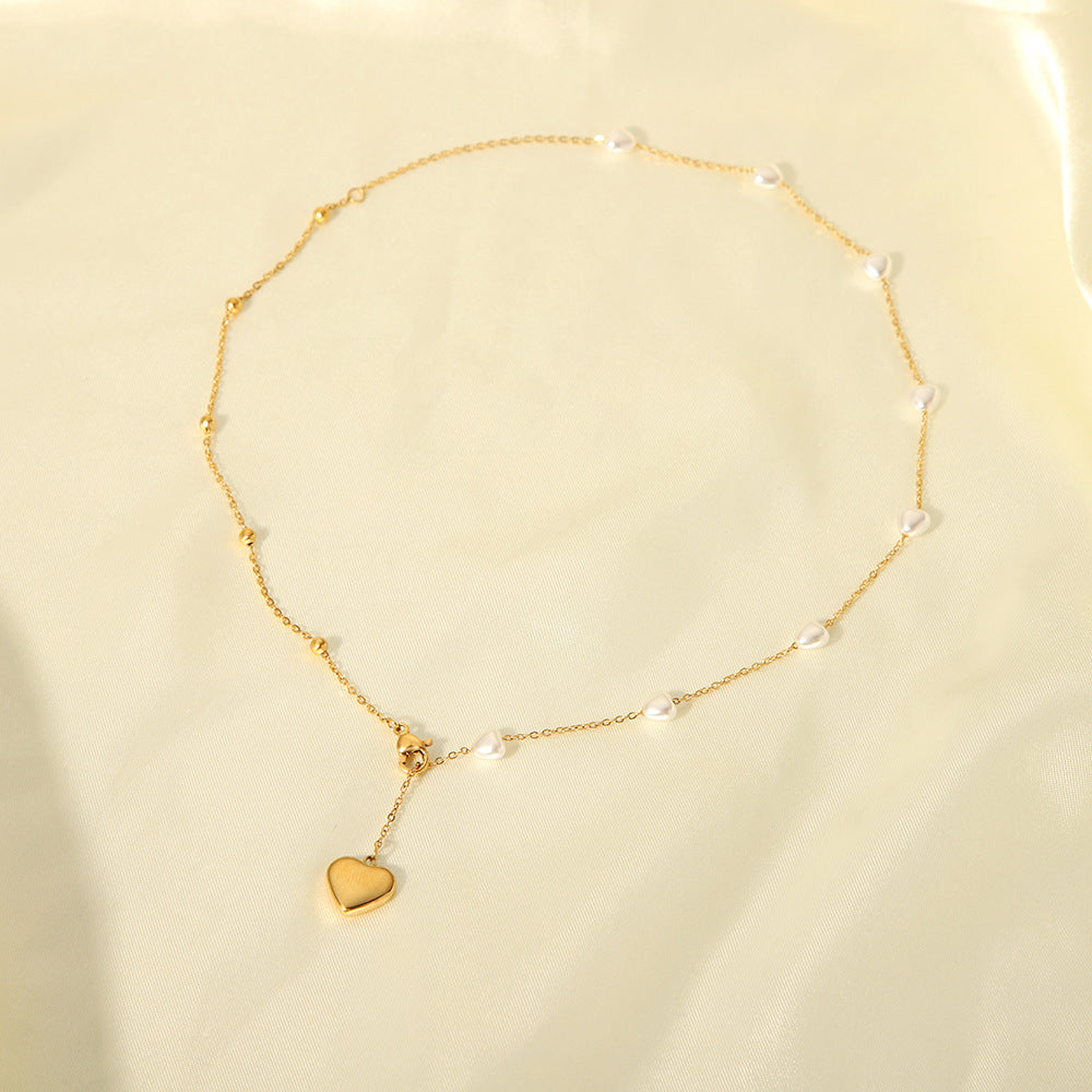 Minimalist Heart-Shaped Titanium Steel Pendant Necklace for Women with Plated Stainless Steel Chain and Pearl Accent