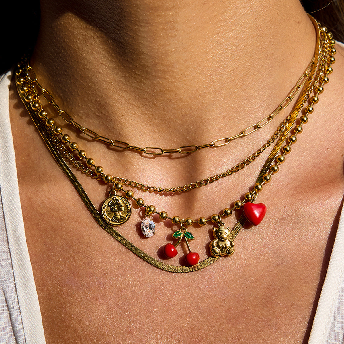Collana minimalista in acciaio inossidabile a forma di ciliegia con intarsio di zirconi per donna, catena a clavicola multistrato in acciaio al titanio placcato