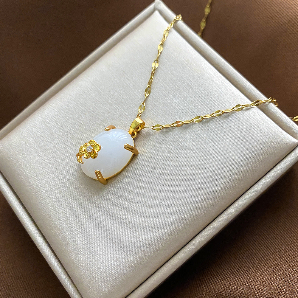 Collana Pendente Floreale Minimalista da Donna e Uomo in Acciaio al Titanio con Finitura Placcata e Catenina a Croce