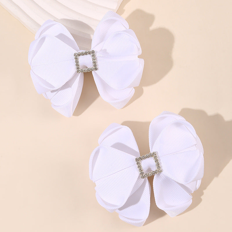 Deliziosa molletta per capelli a fiocco minimalista per bambini in tulle con texture arricciata e a rete