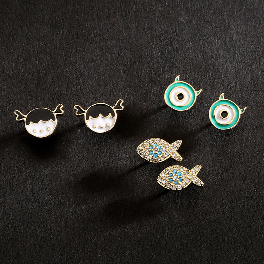 Orecchini a forma di pesce in rame placcato oro 18K con intarsio in zircone, in stile minimalista e geometrico