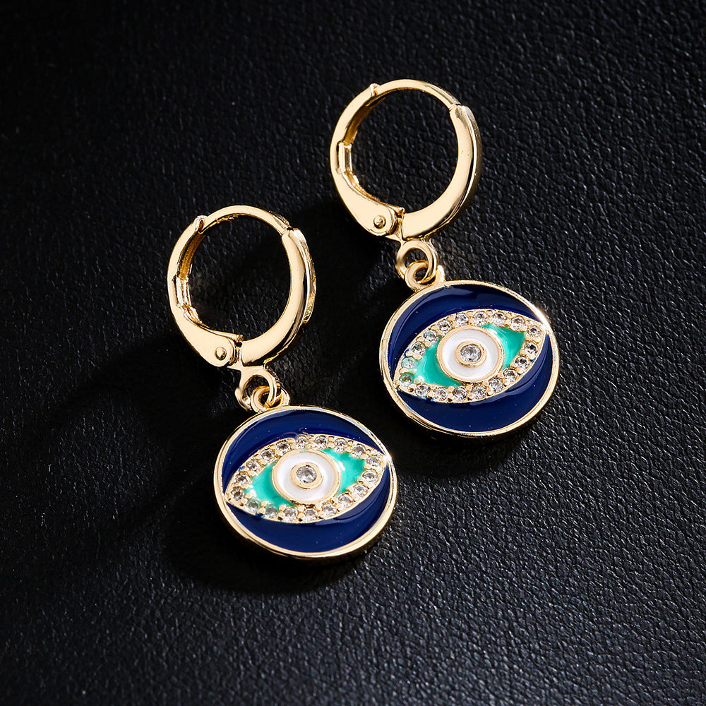 Orecchini geometrici in rame a forma di occhio con placcatura in oro 18 carati e accenti in zirconia smaltata colorata