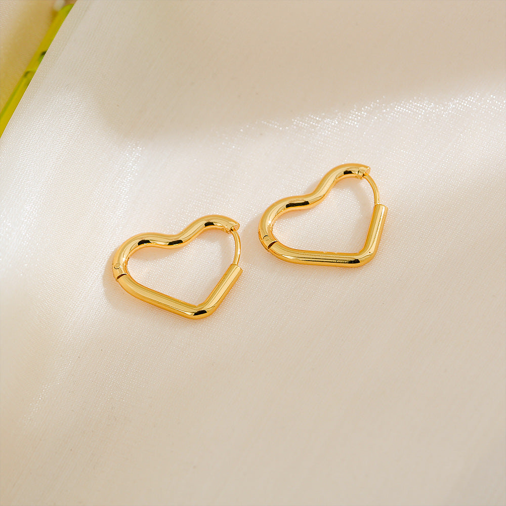 Orecchini a cerchio minimalisti in acciaio inossidabile a forma di cuore con finitura placcata da donna